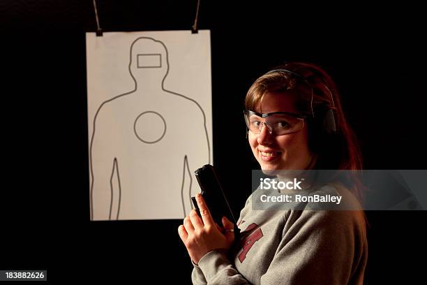 Young Female Shooter No Bullet Holes Stock Photo - Download Image Now - Adult, Blank, Color Image