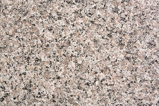 A background with granite texture Nice neutral granite background. Many uses! granite rock stock pictures, royalty-free photos & images