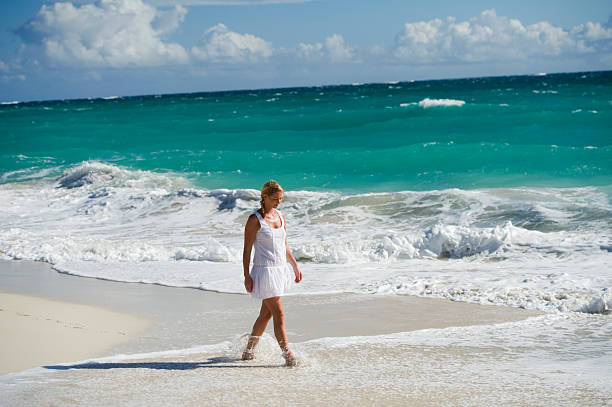 istock Woman by the sea 183883187