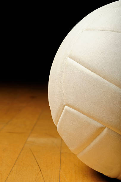 istock Volleyball in an empty gym 183883415