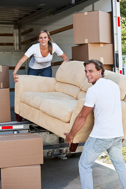 istock Young couple moving house 183883651