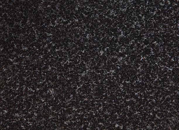 An up close view of black and grey speckled granite  stock photo