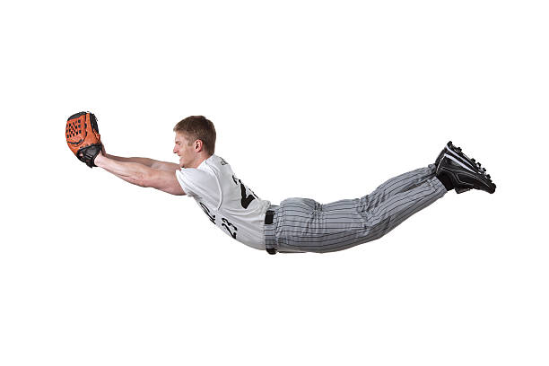 istock Baseball player diving to catch the ball 183883966