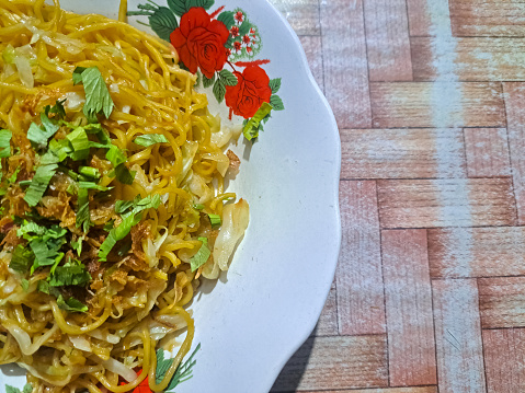 Mie Goreng Tek-Tek Or Fried Noodle With Chopped Chives, Fried Onions. Food Menu