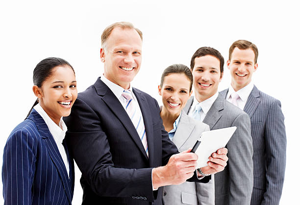 istock Smiling Businesspeople With a Tablet Computer - Isolated 183884133