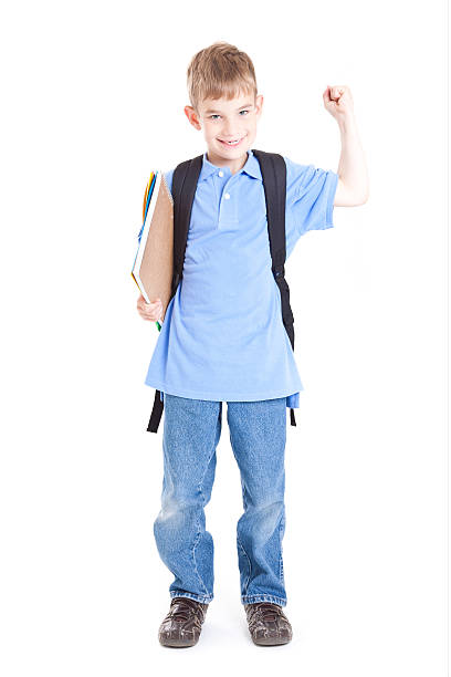istock Young School Student Flexing Arm With Bag and Folders 183884551