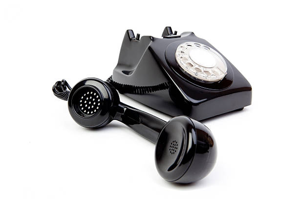 черный телефон - obsolete landline phone old 1970s style стоковые фото и изображения