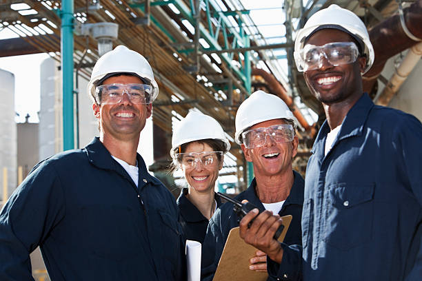 istock Diverse group of workers at manufacturing plant 183885006