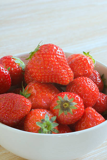 Delicious strawberries in a bucket stock photo