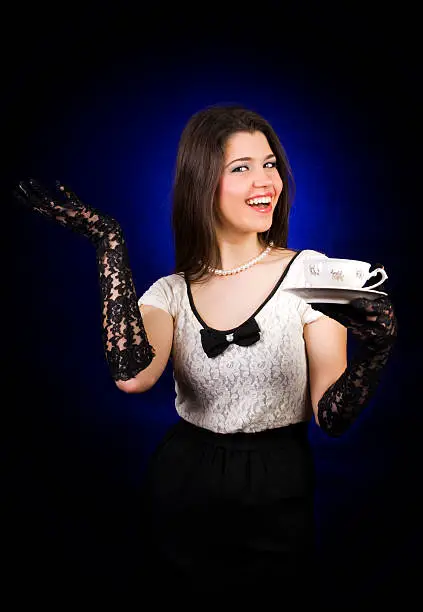 Photo of Elegant woman holding coffee cup