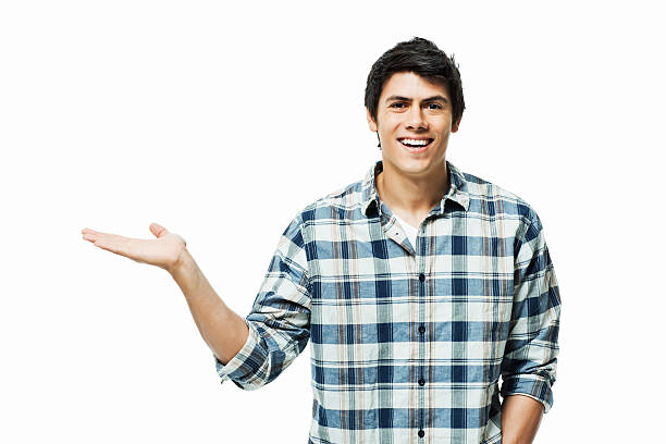 istock Young Man Holding Up an Empty Palm - Isolated 183886162