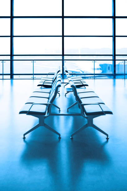 istock Empty seats at a modern airport terminal 183886685