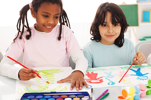 istock Two classmates are painting with watercolors. 183887342