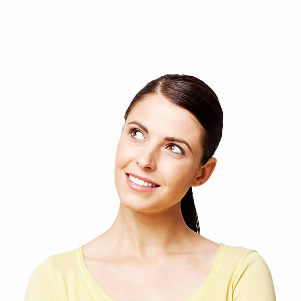 istock Attractive Smiling Woman Looking Up - Isolated 183887507