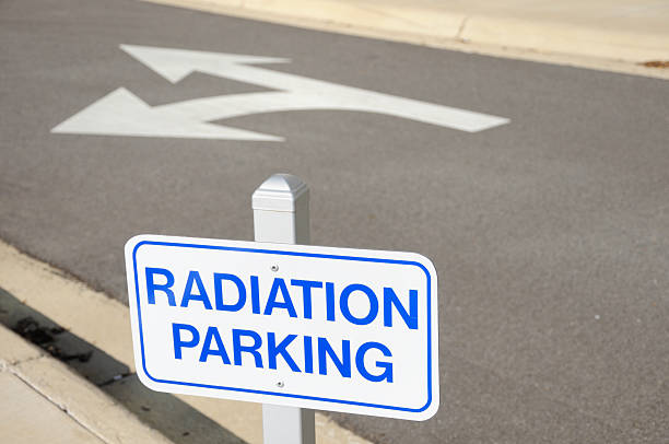 istock Radiation parking sign with directional arrows in background 183887594