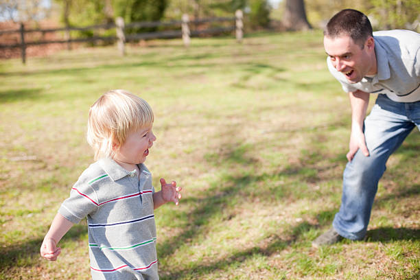 istock Father and son playing together 183887628