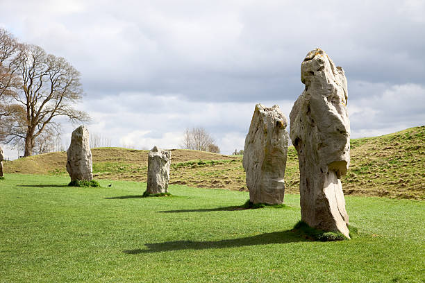 Avebury is the site of the largest and oldest (2600BC) stone circle in the world, predating Stonehenge. The stone circle encloses the village of Avebury, and has two smaller circles within. Additionally, two ancient chalk paths lead to this site. Many of the stones have been lost to misguided inhabitants throughout the ages, but now the site is protected by the National Trust, and is a UNESCO World Heritage site. Just beyond the ring is a wide ditch, going completely around the stone circle. Whatever culture performed whatever rituals with this construction has not been agreed upon by historians. This stone looks just like a druid in robes, to me!