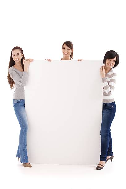 istock Women behind large placard 183887927