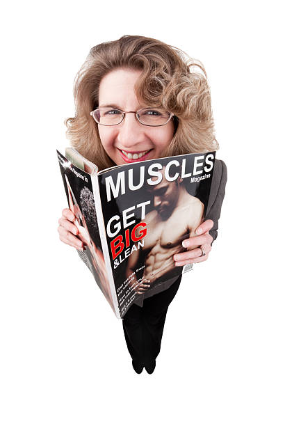 istock Woman Reading Men's Magazine 183887948