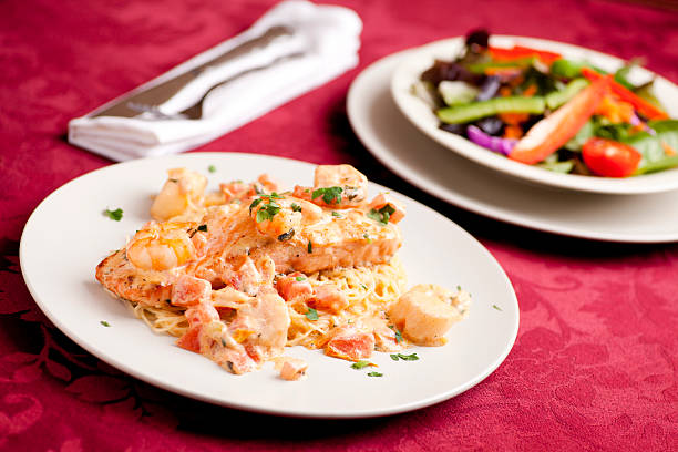 istock Pasta with salmon scallops and shrimp 183889005