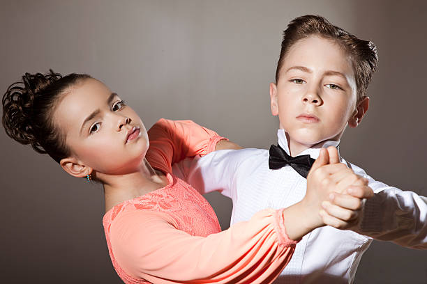 istock Couple of children tangoing 183889205