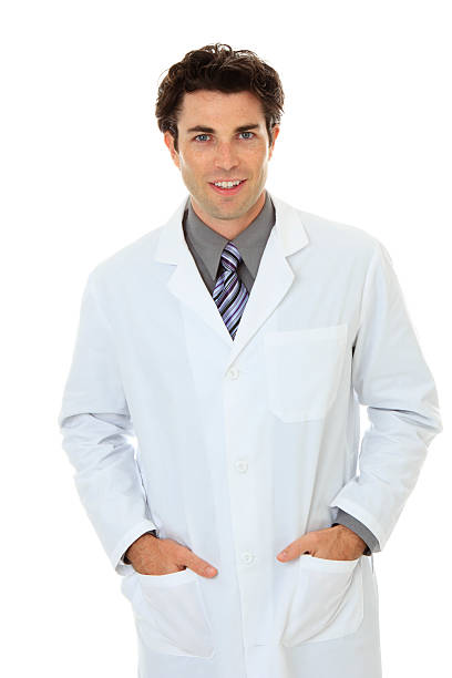 istock Smiling young male wearing lab coat hands in pockets 183889293