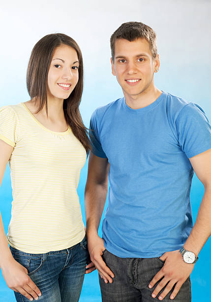 istock Smiling teenage couple. 183889660