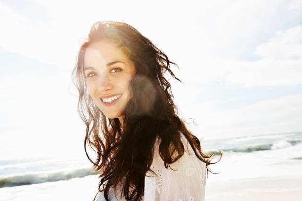 istock Cute woman smiling on a sunny day 183890021