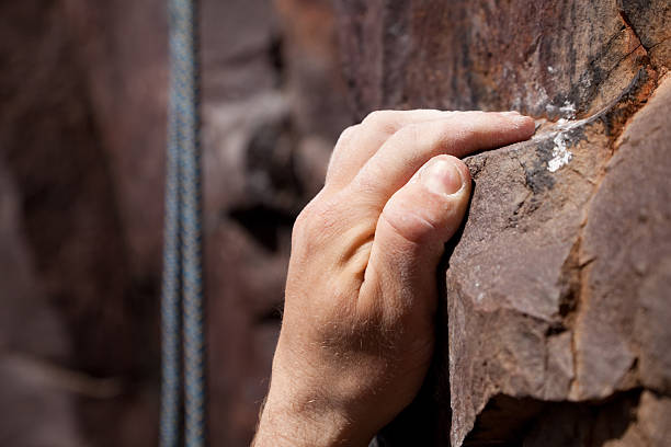 istock Rock climbing - close-up on hand 183890745