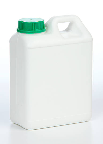 istock One gallon white jug with green cap 183890765
