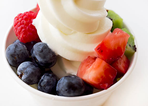 Frozen yogurt and fruit Frozen yogurt and fruit close-up. frozen yoghurt stock pictures, royalty-free photos & images