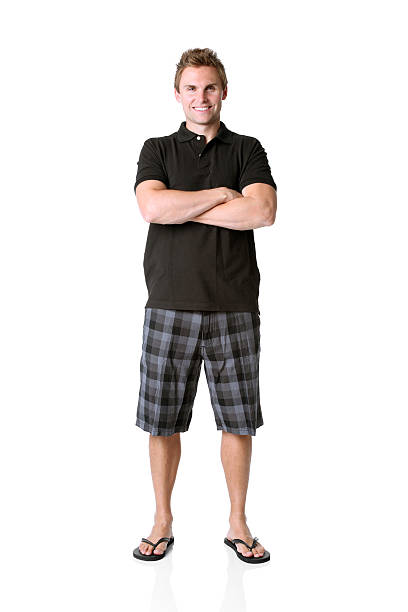 Confident man standing with arms crossed