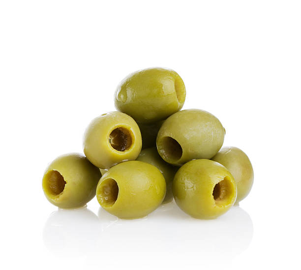 Olives Olives on white background. green olive stock pictures, royalty-free photos & images