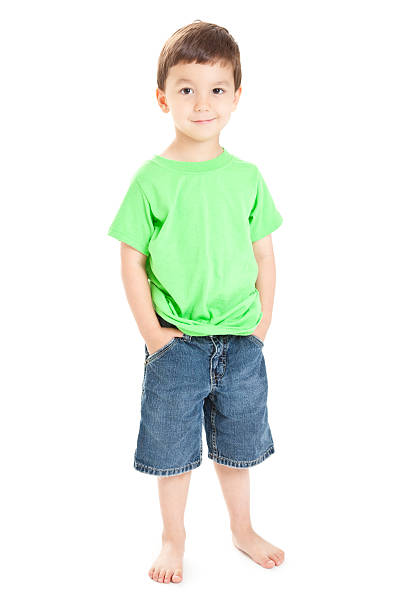 istock Happy Young Boy Standing With Hands in Pockets, White Background 183891601