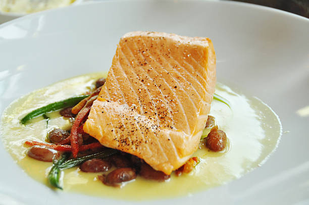 istock Salmon in sauce with vegetables 183891822