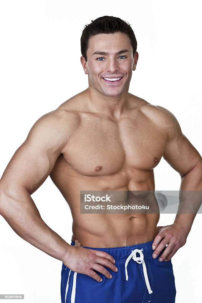 Homem Musculoso vestindo short board - Foto de stock de 20 Anos royalty-free