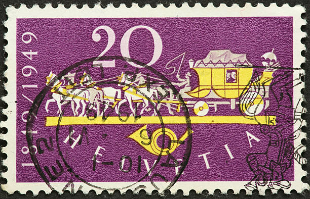 istock fancy vintage horsedrawn carriage on a Swiss postage stamp 183891968