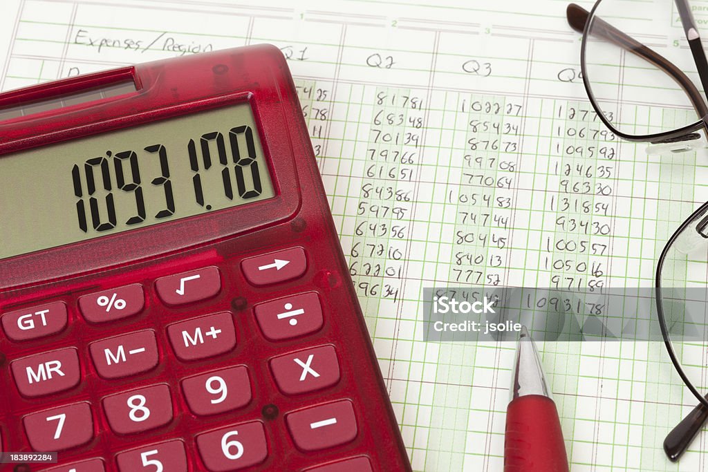 Calculadora e custa ledger-Q4 - Foto de stock de Finanças royalty-free
