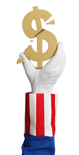 Crumbling Dollar Uncle Sam holding a crumbling dollar. uncle sam broke stock pictures, royalty-free photos & images