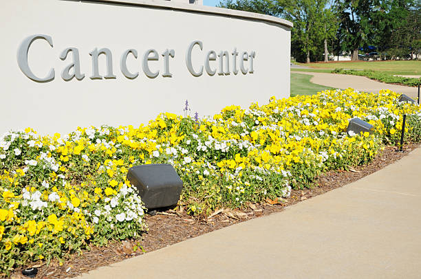istock Cancer center sign with flowers 183892503
