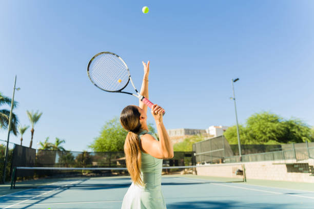istock Hispanic young women exercising playing tennis 1838926481