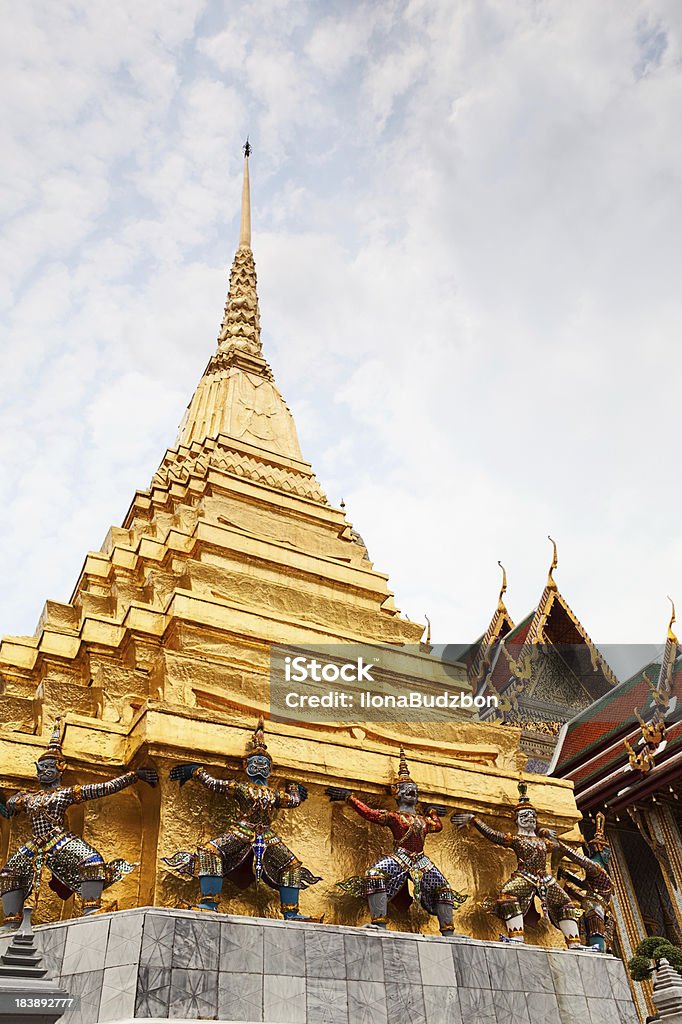 Guardians Surrounding Gold Temple Bangkok "Demons Giant Guardians of Wat Phra Kaeo (Temple of The Emerald Buddha) and Grand Palace in Bangkok, Thailand." Architectural Feature Stock Photo