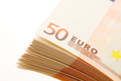 Detail of fifty euro note wad of cash. This is an exclusive image and it can only be found in iStockphoto.
