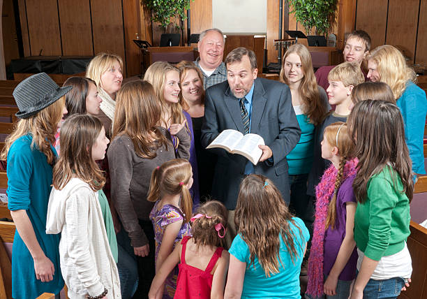 istock Pastor with His People Gathered Around 183893285