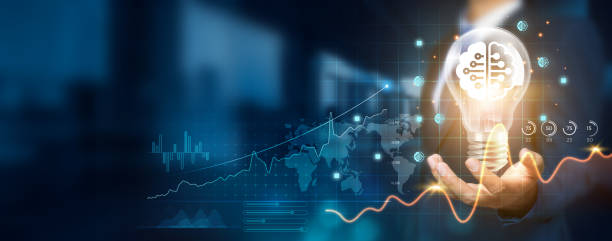 istock Businessman holding a creative light bulb with a growth graph, machine learning icons. Leveraging machine learning innovation and technology to develop new strategies, solutions that enhance success. 1838940103