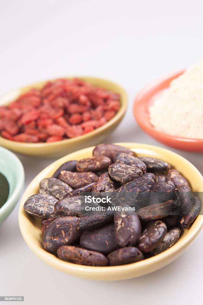 cacao Bohnen, Gojibeeren, spirulina, maca - Lizenzfrei Alternative Behandlungsmethode Stock-Foto