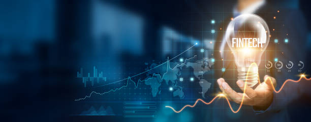 istock Businessman holding creative light bulb with growth graph and financial technology icons. Fintech innovation technology develops new solutions and strategies that enhance successful and profit. 1838942188