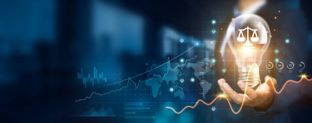 istock Businessman holding creative light bulb with growth graph and legal technology icons. Leveraging legal technology to develop new strategies and solutions that enhance successful and profit in global. 1838943230