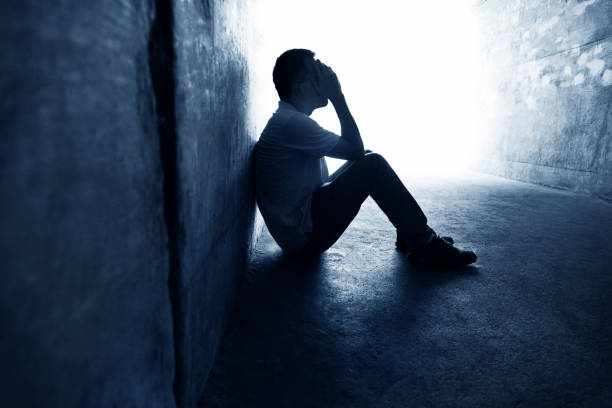 istock Desperate man sitting in the tunnel 1838952041