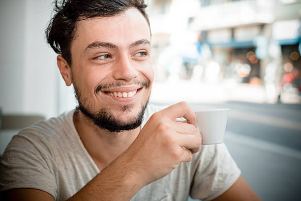 istock young stylish man at the bar 183895635